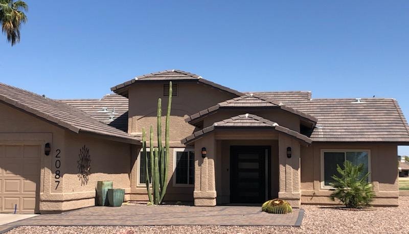 Concrete tile roof on a Mesa, Arizona home with desert landscaping
